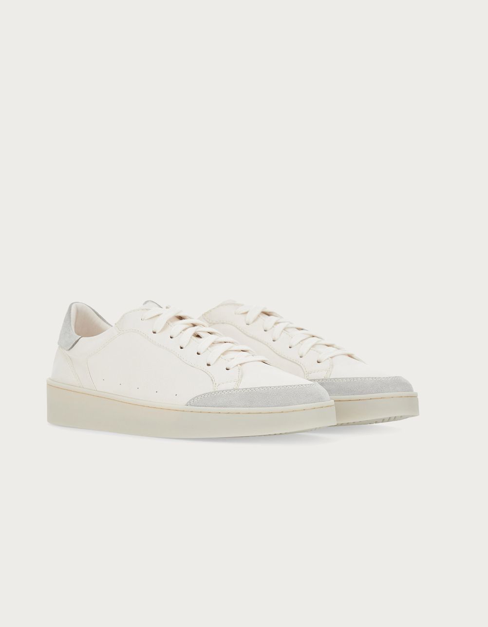 White leather and suede sneaker